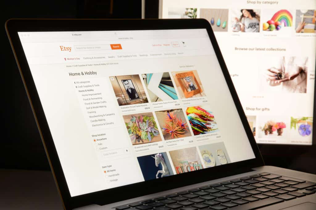 Laptop showing an Etsy shop where you could buy art from emerging artists.