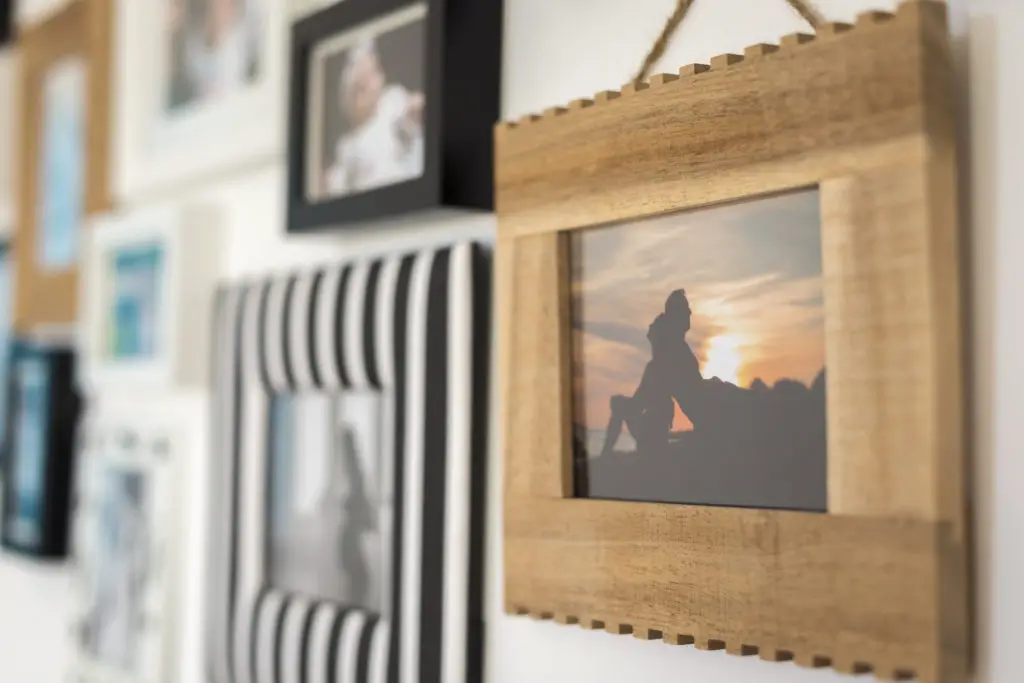 Framed photos arranged as a gallery wall