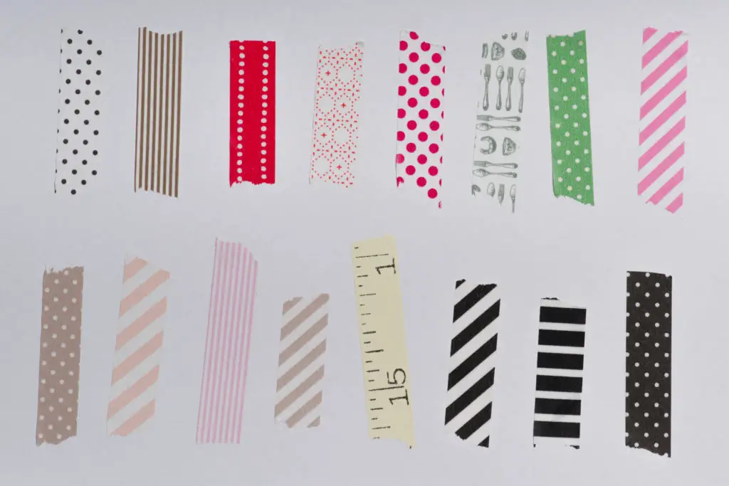 Different washi tapes displayed to show how to stick paper to walls without damaging paint.
